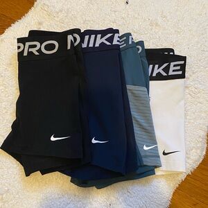 Bundle of 4 Nike Pro Dri-FIT shorts, black, navy, green, white, XS